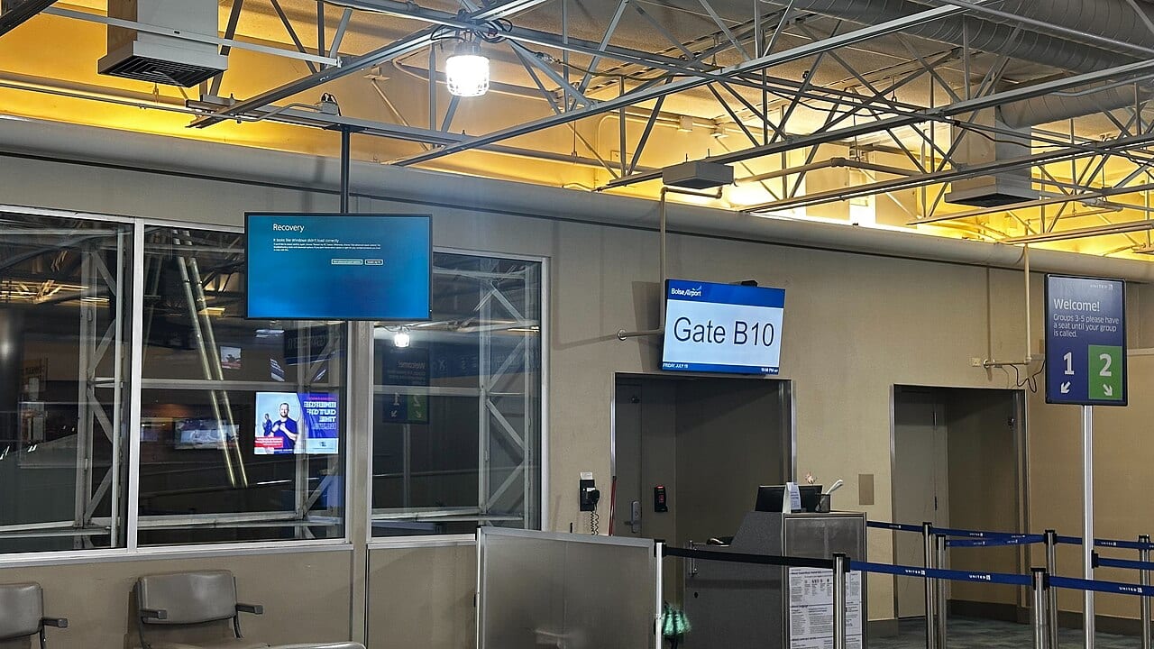 A blue screen of death displayed on an airport monitor in Boise, Idaho, the evening of the CrowdStrike outage.