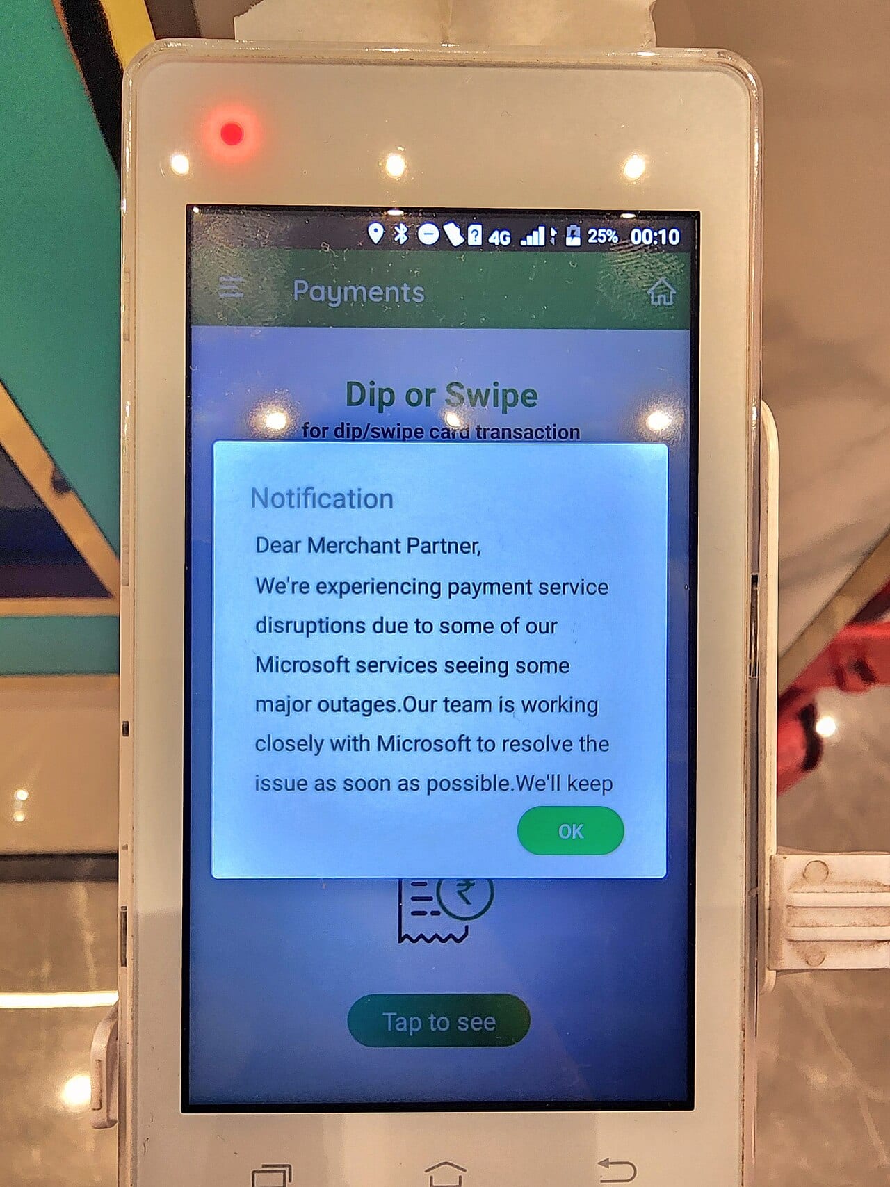 A payment terminal displaying a service-disruption error message following the July 2024 outage.