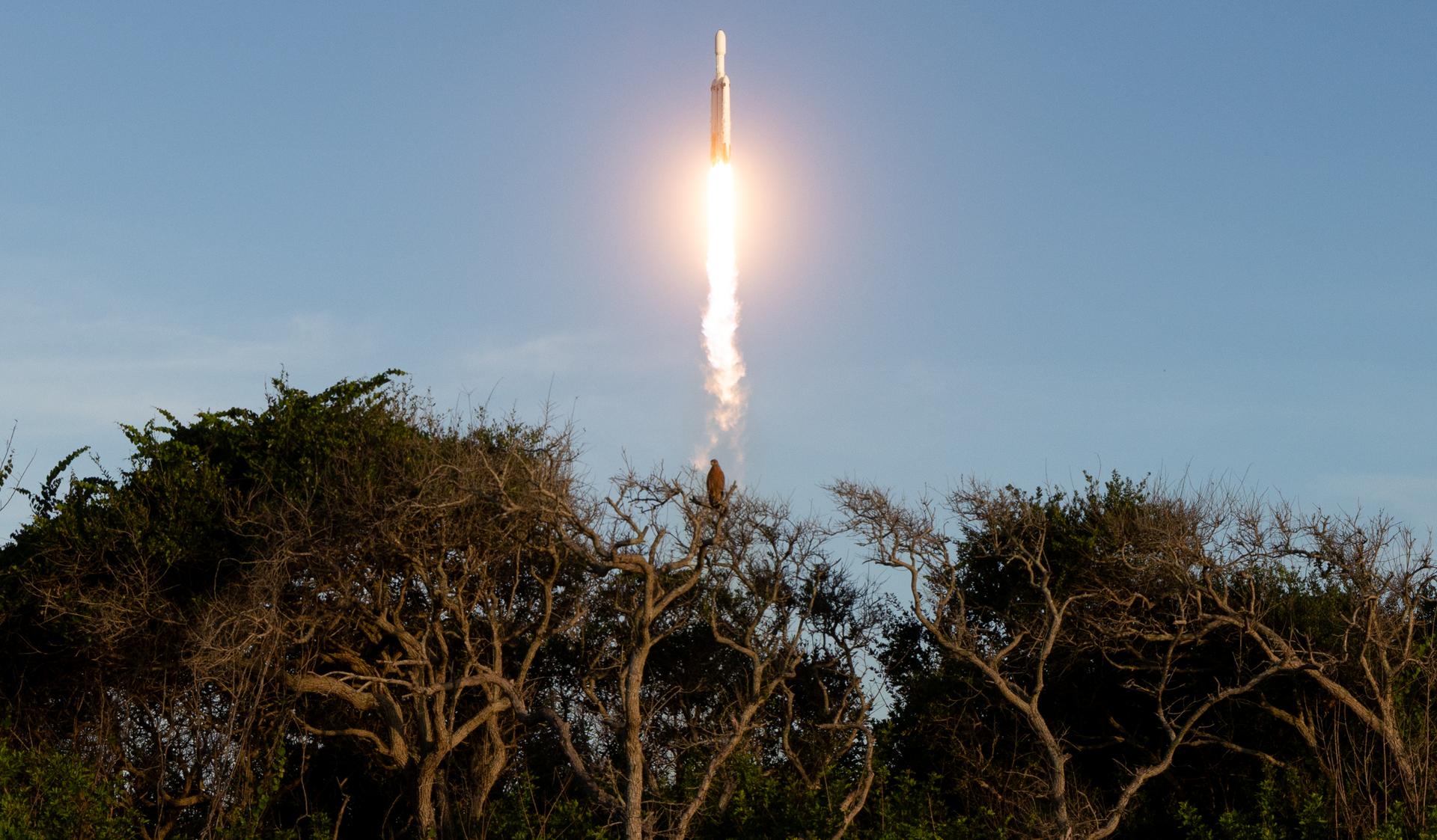 A SpaceX Falcon Heavy rocket carrying the Nancy Grace Roman Space Telescope lifting off from Launch Complex 39A at Kennedy Space Center on August 30, 2026.